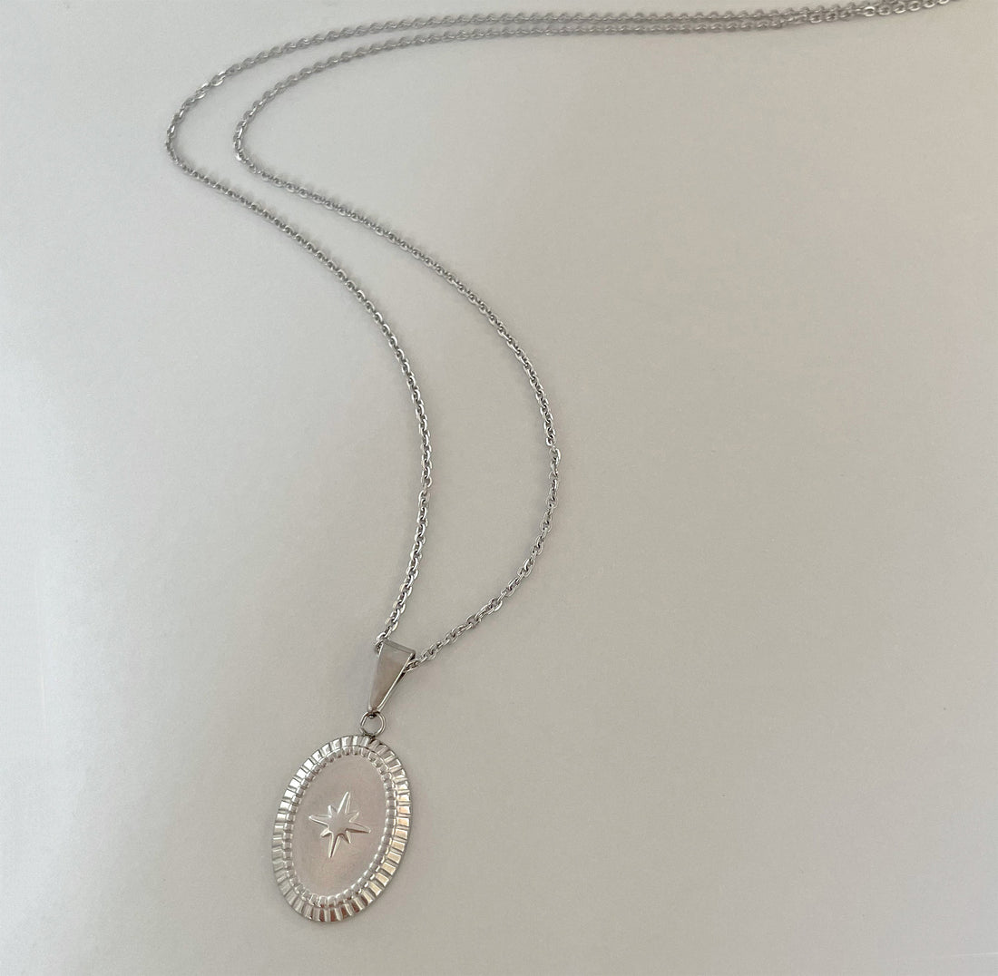 SILVER STARBURST PENDANT NECKLACE